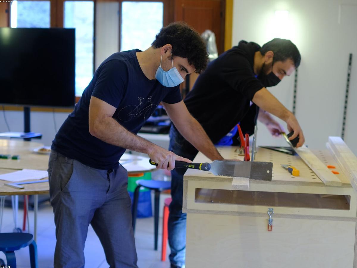 A maker in a fabrication workshop